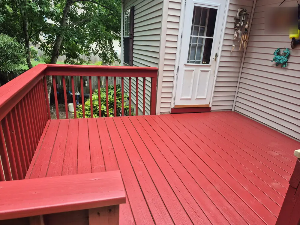Deck, railing and built-in bench finished in red
